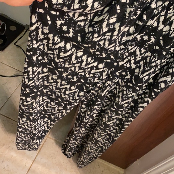 Long romper with lace middle front. - Picture 2 of 2